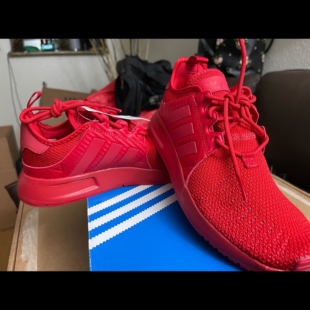 Adidas red tennis shoes